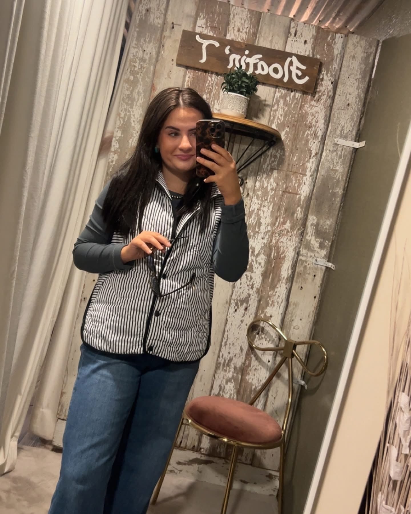 Black and White Striped Puffer Vest with Pockets. ￼