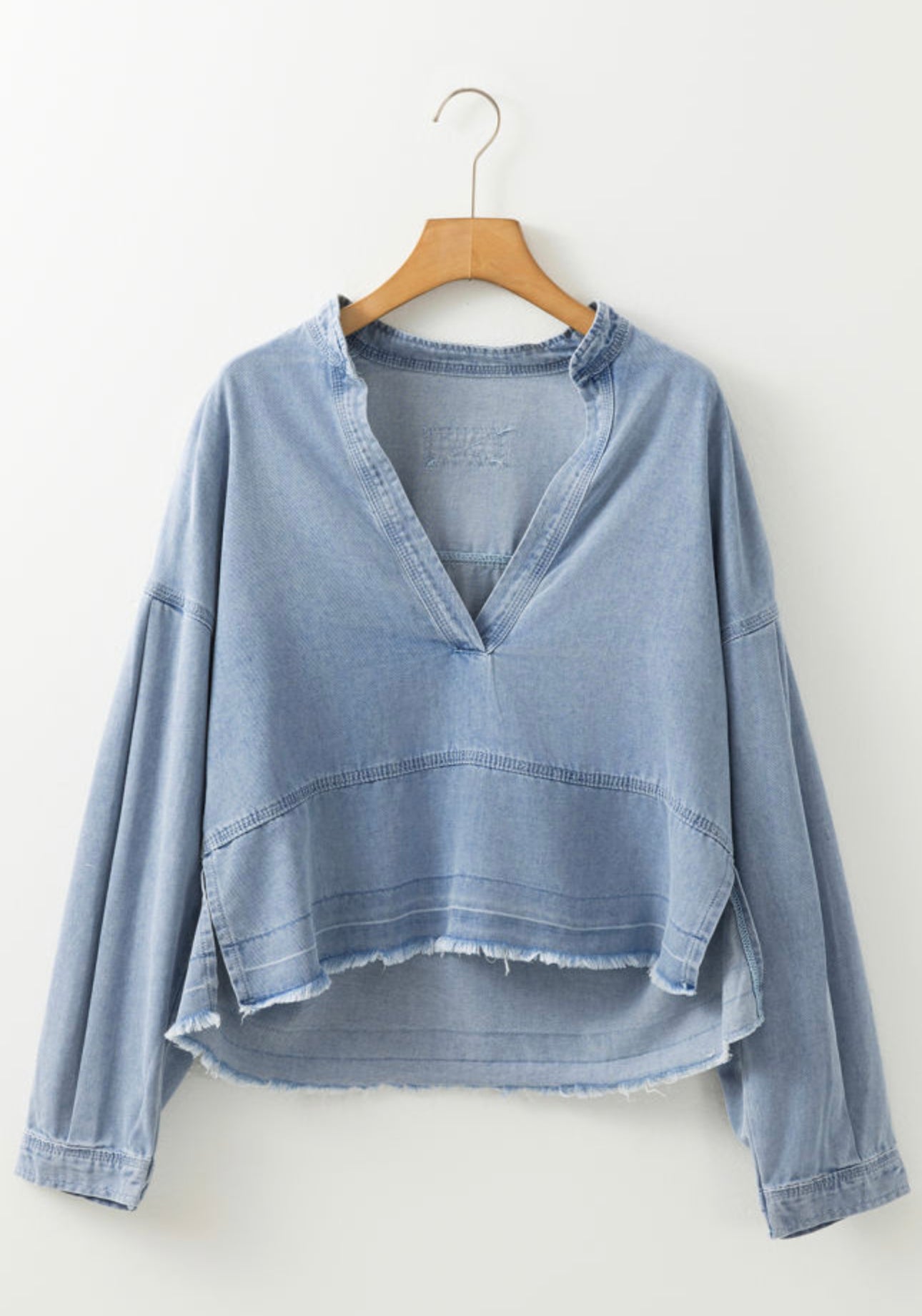 Beau Blue Light Wash Exposed
Stitching Raw Hem V Neck Denim Top