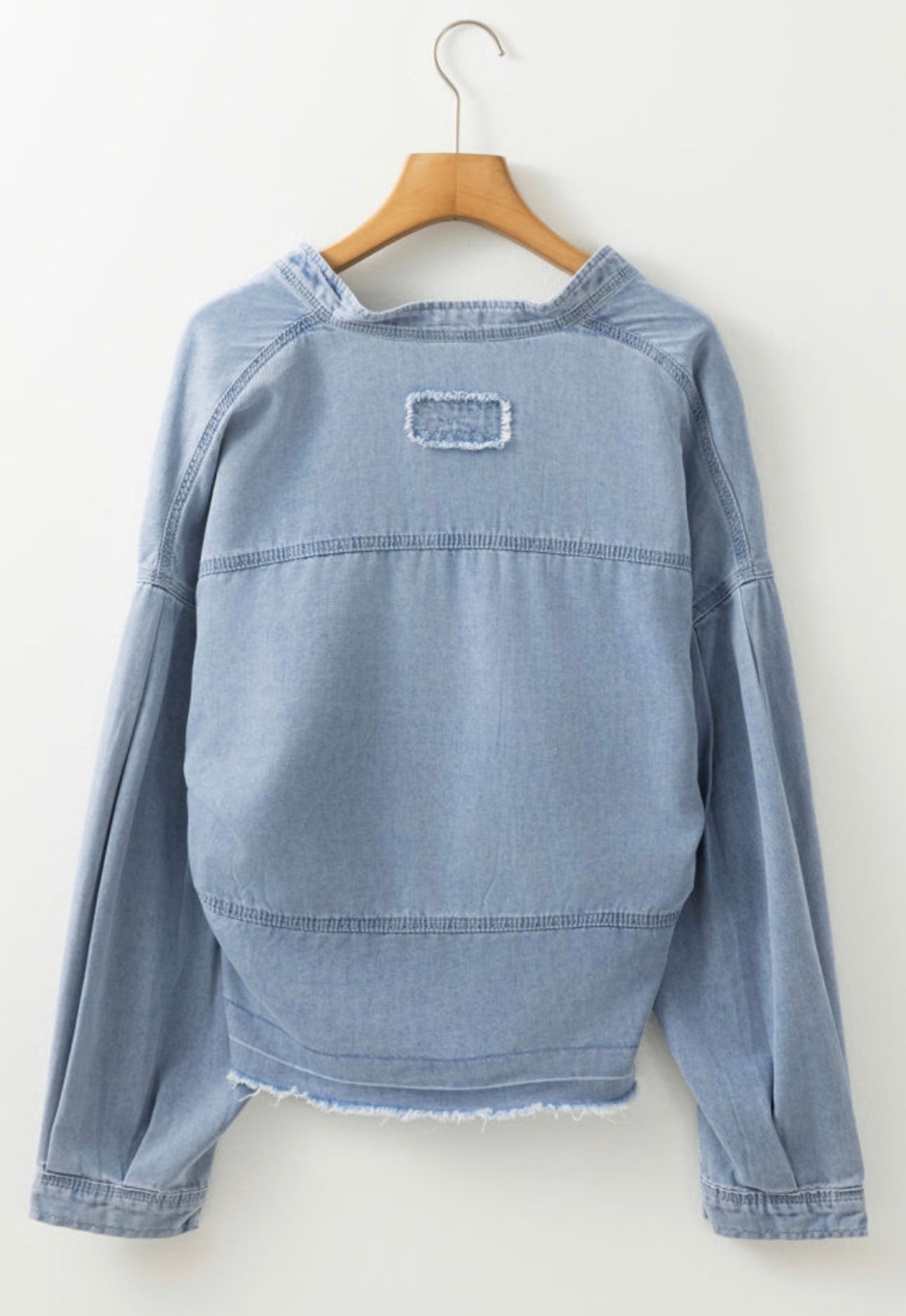 Beau Blue Light Wash Exposed
Stitching Raw Hem V Neck Denim Top