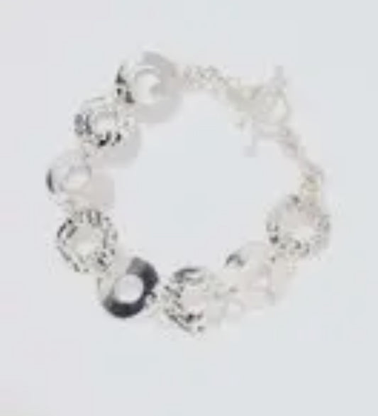 Sterling Silver Circles
Charm Bracelet